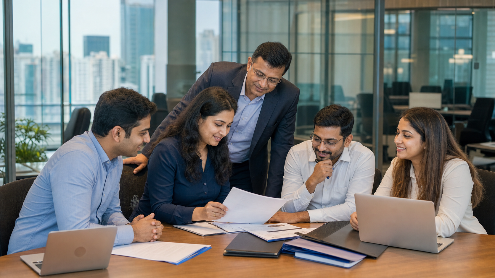 Indian insurance broking team reviewing client risk documents